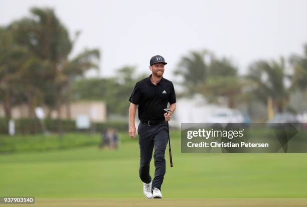 Tyler McCumber reacts to his shot on the 18th hole during the final round of the Corales Puntacana Resort & Club Championship on March 25, 2018 in...