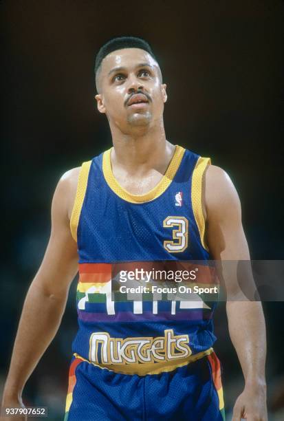 Mahmoud Abdul-Rauf of the Denver Nuggets looks on against the Washington Bullets during an NBA basketball game circa 1991 at the Capital Centre in...