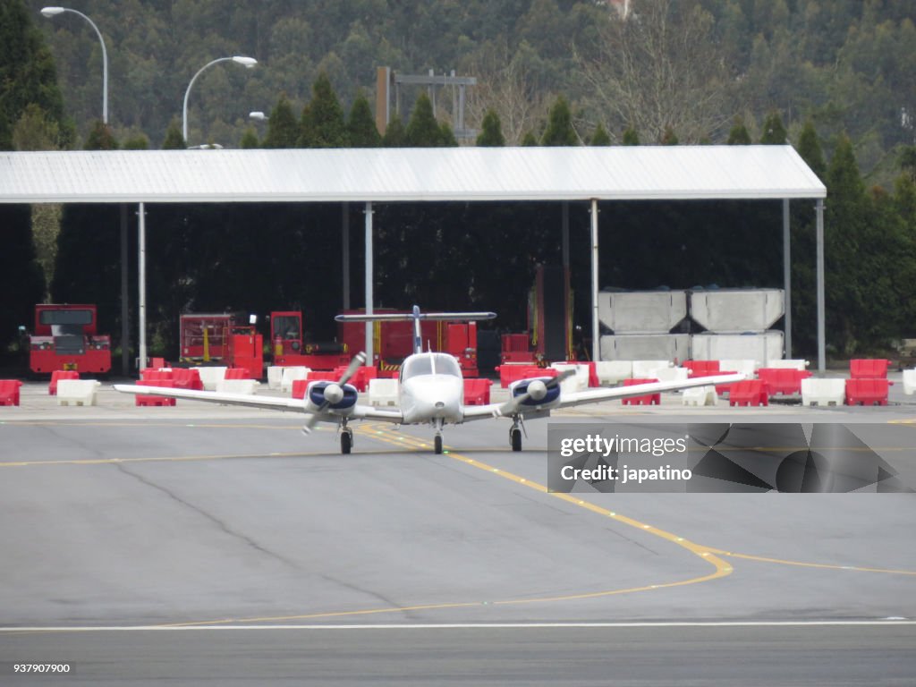 Small plane waiting for a runway to take off