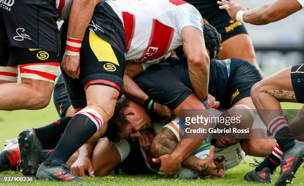Lionel Mapoe of Lions is tackled by Nahuel Tetaz Chaparro of Jaguares during a match between Jaguares and Lions as part of the sixth round of Super...