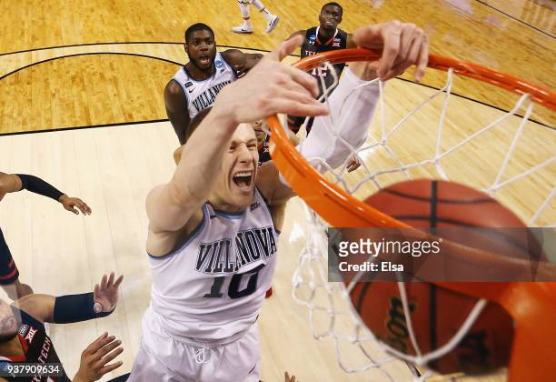 Donte DiVincenzo of the Villanova Wildcats dunks the ball during the second half against the Texas Tech Red Raiders in the 2018 NCAA Men's Basketball...