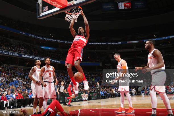 Ian Mahinmi of the Washington Wizards drives to the basket during the game against the New York Knicks on March 25, 2018 at the Capital One Arena in...