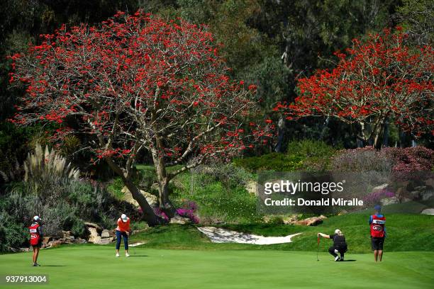 Cindy Lacrosse and Caroline Headwall of Sweden putt on the 4th hole during the Final Round of the LPGA KIA CLASSIC at the Park Hyatt Aviara golf...
