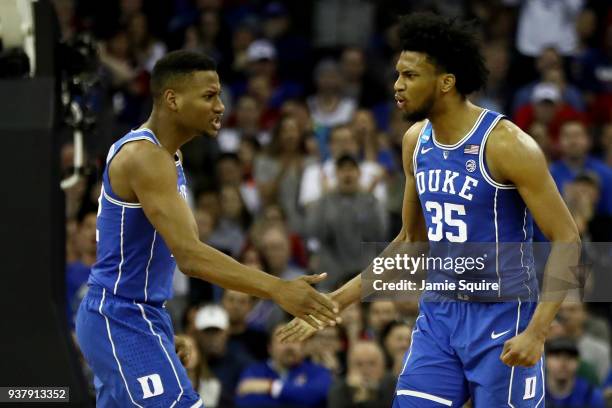 Marvin Bagley III and Javin DeLaurier of the Duke Blue Devils celebrate a three point basket against the Kansas Jayhawks during the second half in...