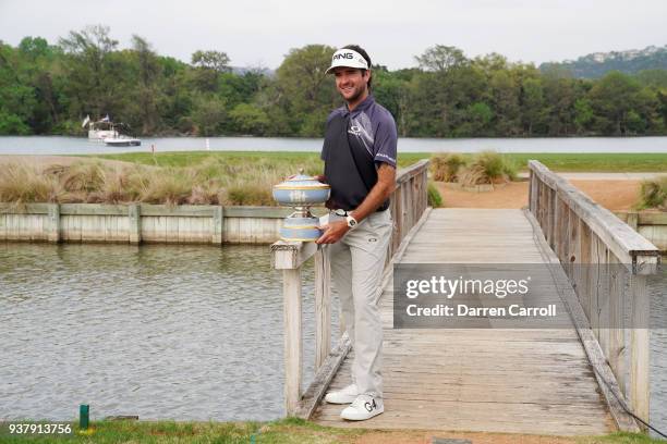 Bubba Watson of the United States celebrates with the Walter Hagen Cup after winning the World Golf Championships-Dell Match Play at Austin Country...