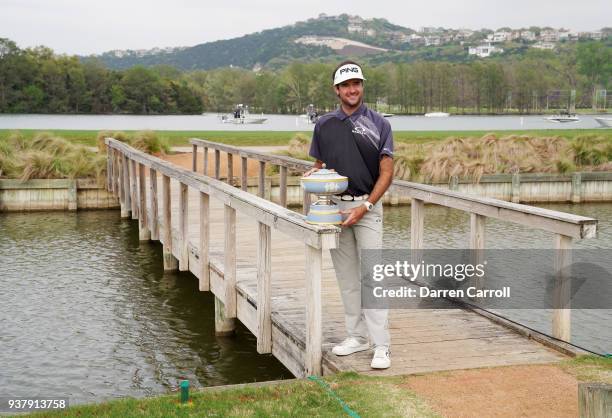 Bubba Watson of the United States celebrates with the Walter Hagen Cup after winning the World Golf Championships-Dell Match Play at Austin Country...