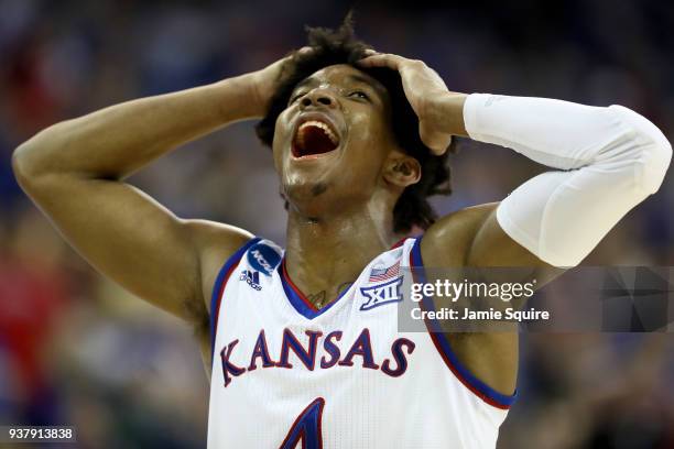 Devonte' Graham of the Kansas Jayhawks reacts against the Duke Blue Devils during the second half in the 2018 NCAA Men's Basketball Tournament...