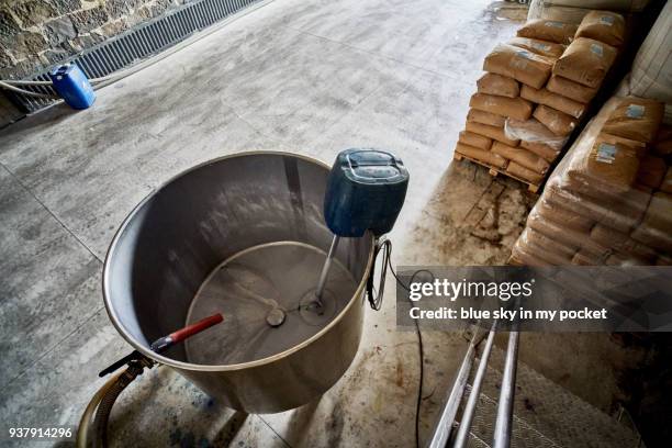 sugar mixing industrial machinery at the cooperativa vinícola são joão, southern brazil. - cooperativa stock pictures, royalty-free photos & images