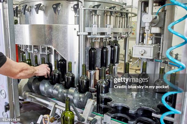 corking machine. at cooperativa vinícola são joão, southern brazil. - cooperativa stock pictures, royalty-free photos & images