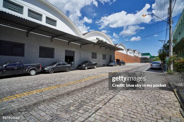 the exterior view of the cooperativa vinícola são joão, southern brazil. - cooperativa stock pictures, royalty-free photos & images