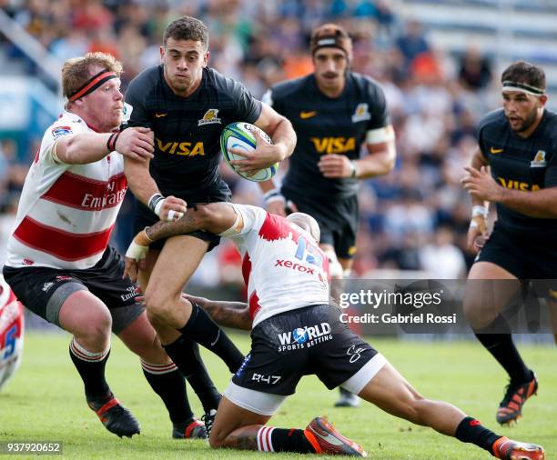 Emiliano Boffelli of Jaguares is tackled by Elton Jantjies of Lions during a match between Jaguares and Lions as part of the sixth round of Super...