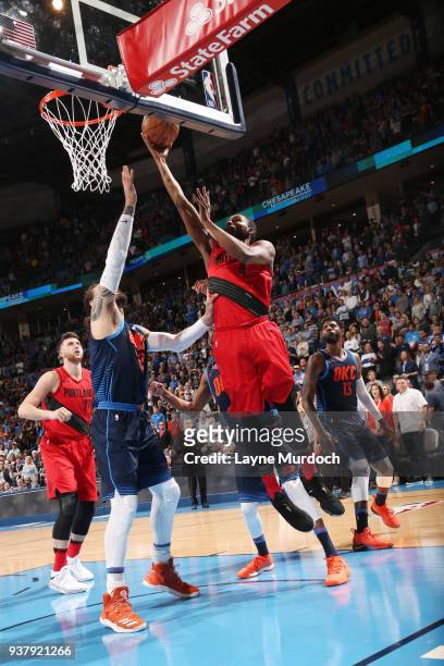 Maurice Harkless of the Portland Trail Blazers handles the ball against the Oklahoma City Thunder on March 25, 2018 at Chesapeake Energy Arena in...