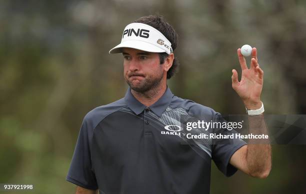Bubba Watson of the United States celebrates on the 12th green after defeating Kevin Kisner of the United States 7&6 to win during the final round of...