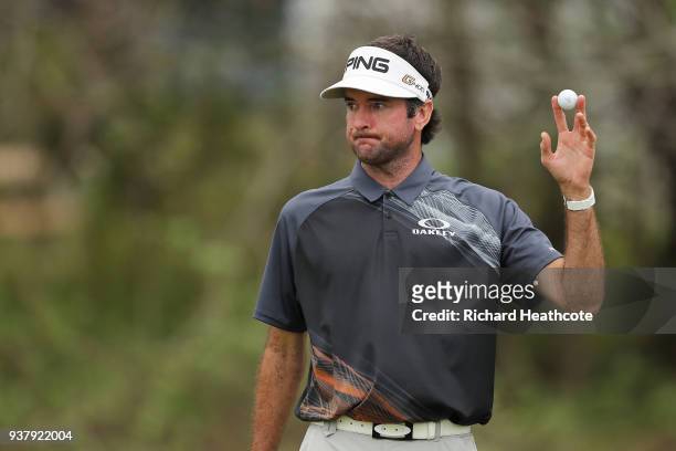 Bubba Watson of the United States celebrates on the 12th green after defeating Kevin Kisner of the United States 7&6 to win during the final round of...