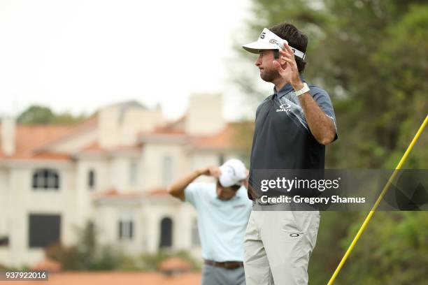 Bubba Watson of the United States celebrates on the 12th green after defeating Kevin Kisner of the United States 7&6 to win during the final round of...