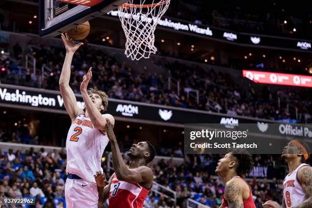 Luke Kornet of the New York Knicks attempts a lay up against the Washington Wizards during the first half at Capital One Arena on March 25, 2018 in...