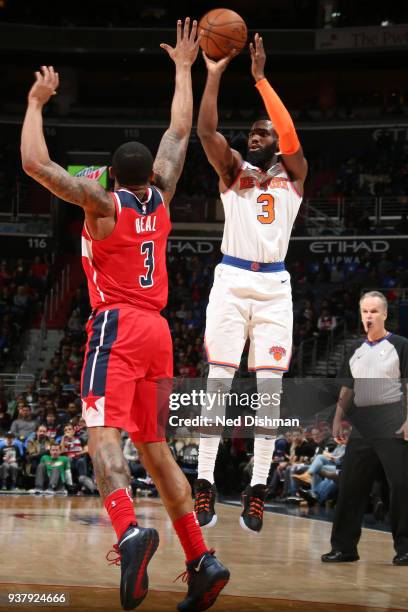 Tim Hardaway Jr. #3 of the New York Knicks shoots the ball during the game against Bradley Beal of the Washington Wizards on March 25, 2018 at the...
