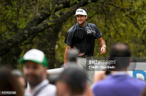 Bubba Watson reacts to cheering fans on the tenth hole during the championship match at the World Golf Championships-Dell Technologies Match Play at...