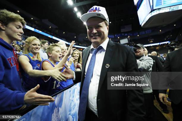 Head coach Bill Self of the Kansas Jayhawks walks off the court after his team defeated the Duke Blue Devils in the 2018 NCAA Men's Basketball...
