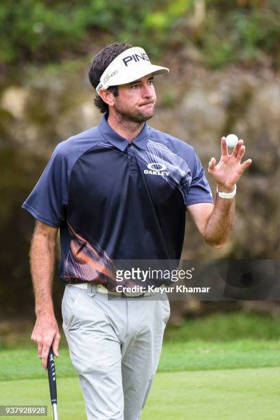 Bubba Watson waves his all to fans on the third hole green during the championship match at the World Golf Championships-Dell Technologies Match Play...