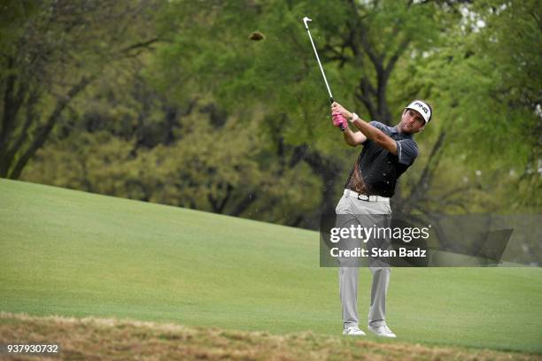 Bubba Watson plays a chip shot on the tenth hole during the championship match at the World Golf Championships-Dell Technologies Match Play at Austin...