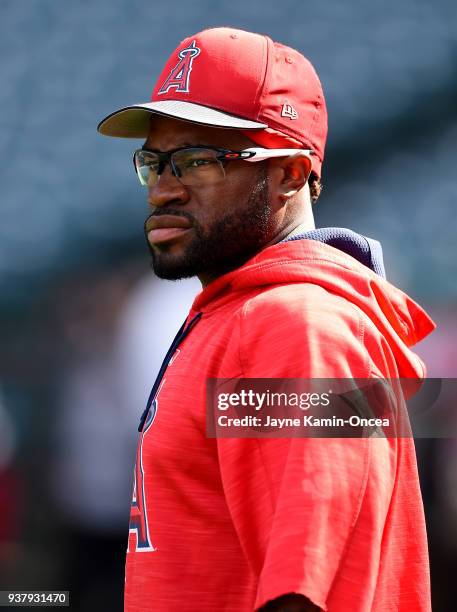 Eric Young Jr. #9 of the Los Angeles Angels of Anaheim warms up before the spring training game against the Los Angeles Dodgers at Angel Stadium on...