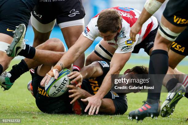 Kwagga Smith of Lions attemps to steal the ball from Pablo Matera of Jaguares of Lions during a match between Jaguares and Lions as part of the sixth...