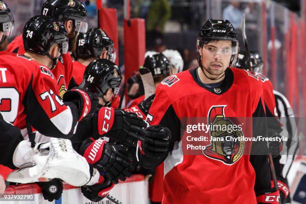 Cody Ceci of the Ottawa Senators celebrates a third period goal by teammate Filip Chlapik against the Edmonton Oilers at Canadian Tire Centre on...