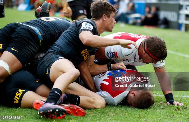 Malcolm Marx of Lions scores a try during a match between Jaguares and Lions as part of the sixth round of Super Rugby at Jose Amalfitani Stadium on...