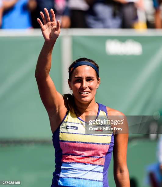 Monica Puig of Puerto Rico celebrates winning her match against Maria Sakkari of Greece 6-3 7-5 during Day 7 of the Miami Open Presented by Itau at...