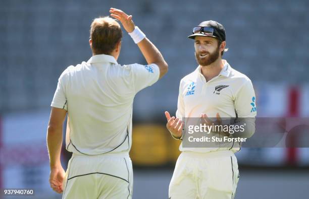 New Zzealand captain Kane Williamson chats with bowler Neil Wagner during day five of the First Test Match between the New Zealand Black Caps and...