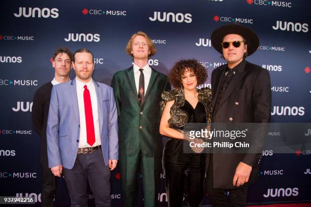 Jeremy Gara, Tim Kingsbury, Richard Reed Parry, Regine Chassagne and Win Butler of Arcade Fire attend the red carpet arrival at the 2018 Juno Awards...