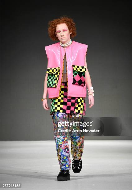 Model walks the runway wearing Profanity by LillzKillz at 2018 Vancouver Fashion Week - Day 5 on March 23, 2018 in Vancouver, Canada.