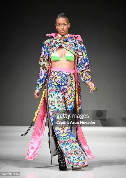 Model walks the runway wearing Profanity by LillzKillz at 2018 Vancouver Fashion Week - Day 5 on March 23, 2018 in Vancouver, Canada.