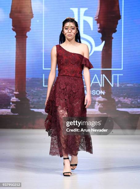 Model walks the runway wearing Luxesaint at 2018 Vancouver Fashion Week - Day 5 on March 23, 2018 in Vancouver, Canada.