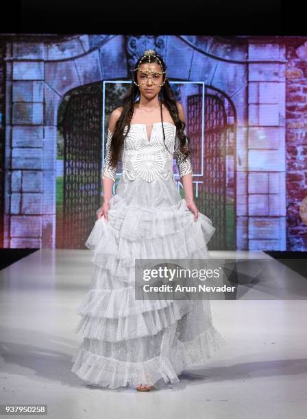 Model walks the runway wearing Luxesaint at 2018 Vancouver Fashion Week - Day 5 on March 23, 2018 in Vancouver, Canada.