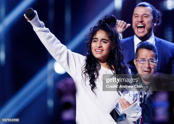 Canadian singer-songwriter Jessie Reyez receives the award for 'Breakthrough Artist of the Year' during the 2018 JUNO Awards at Rogers Arena on March...