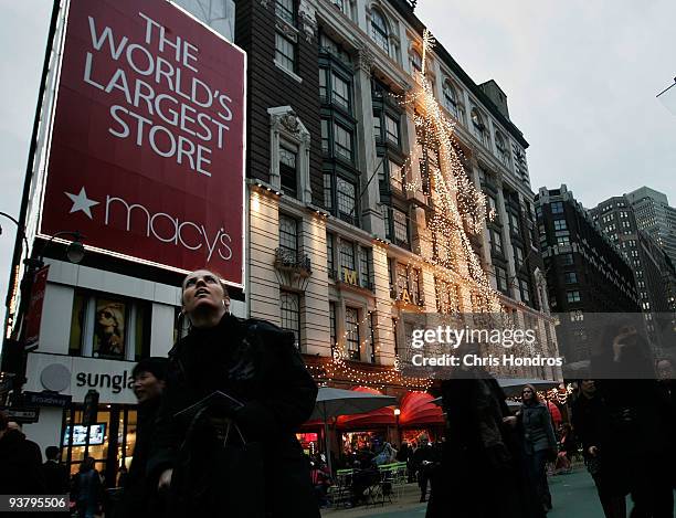 People walk in front of Macy's department store in midtown Manhatann December 3, 2009 in New York City. Retail sales declined 0.3 percent, with...