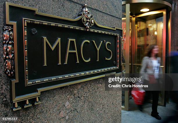 Shopper exits Macy's department store December 3, 2009 in New York City. Retail sales declined 0.3 percent, with Macy's dopping 6.1 percent, in...