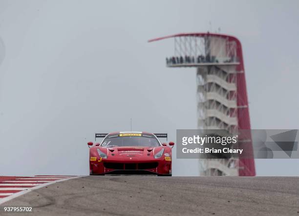 The Ferrari 488 GT3 of Toni Vilander of Finland, and Miguel Molina, of Spain, races on the track during the GT race during the Pirelli World...