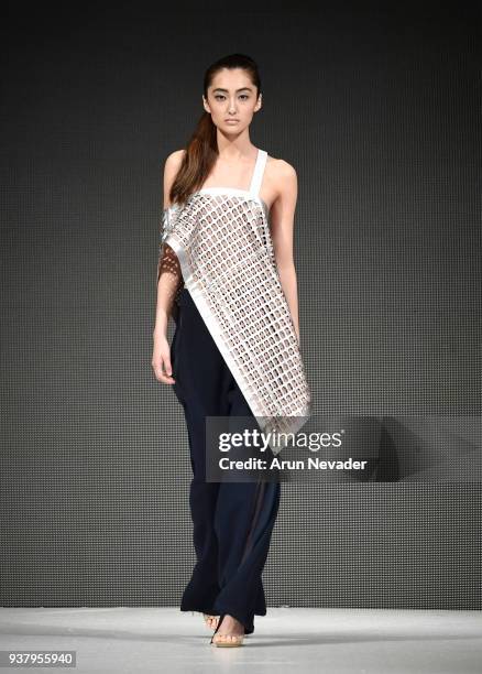 Model walks the runway wearing Allie Howard at 2018 Vancouver Fashion Week - Day 5 on March 23, 2018 in Vancouver, Canada.