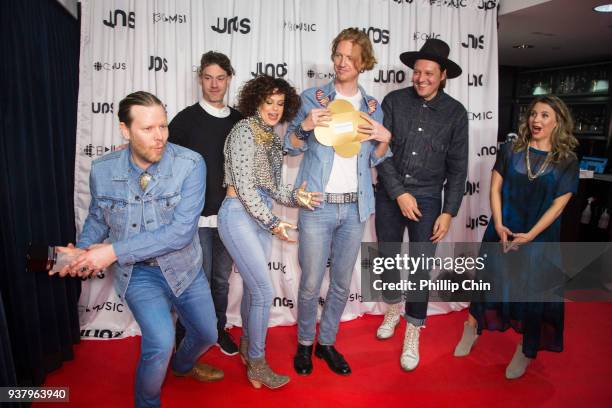 Juno Awards winners Tim Kingsbury, Jeremy Gara, Regine Chassagne, Richard Reed Parry and Win Butler of Arcade Fire attend the press conference room...