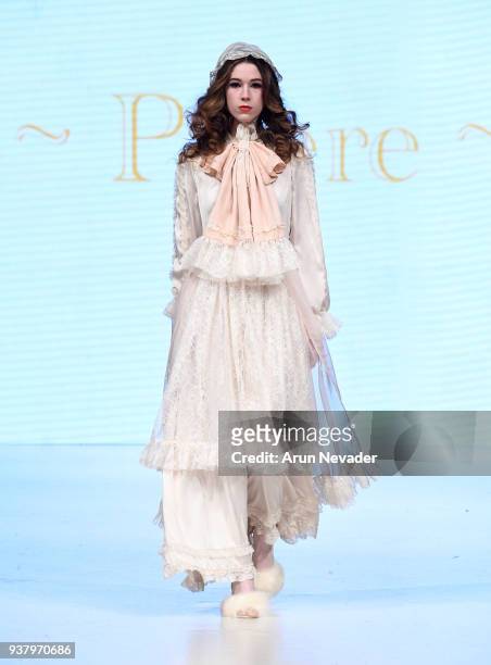 Model walks the runway wearing Priere at 2018 Vancouver Fashion Week - Day 5 on March 23, 2018 in Vancouver, Canada.