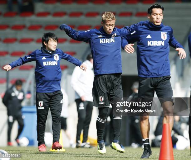 Japan internationals Shoya Nakajima, Keisuke Honda and Tomoaki Makino train in Liege, Belgium, on March 25, 2018. ==Kyodo