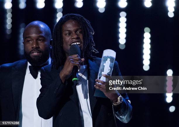 Canadian singer-songwriter Daniel Caesar receives the award during the 2018 JUNO Awards at Rogers Arena on March 25, 2018 in Vancouver, Canada.
