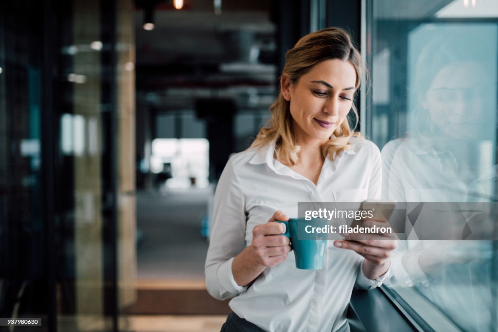 Professional Businesswoman texting