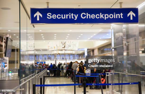 security checkpoint sign at the airport - lax airport stock pictures, royalty-free photos & images