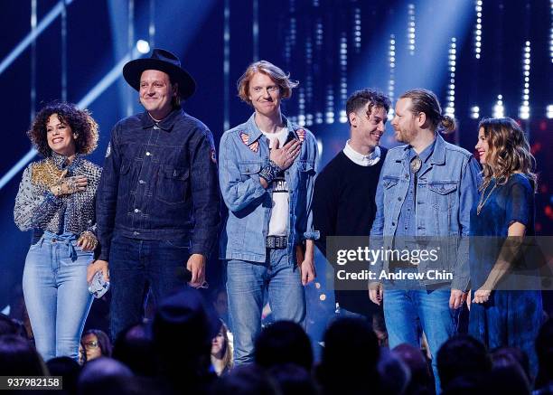 Regine Chassagnes, Win Butler, Richard Reed Parry, Jeremy Gara and Tim Kingsbury of Arcade Fire receive the award during the 2018 JUNO Awards at...