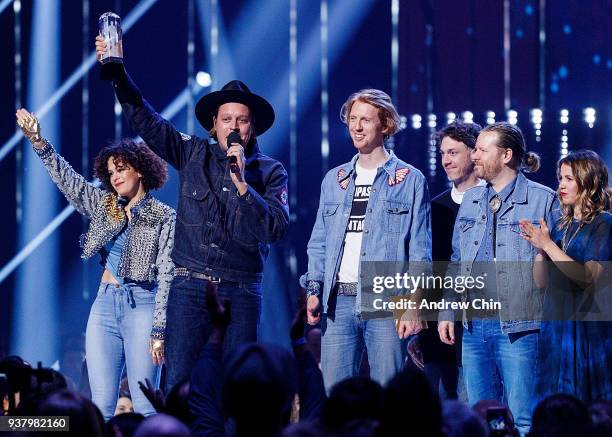 Regine Chassagnes, Win Butler, Richard Reed Parry, Jeremy Gara and Tim Kingsbury of Arcade Fire receive the award during the 2018 JUNO Awards at...