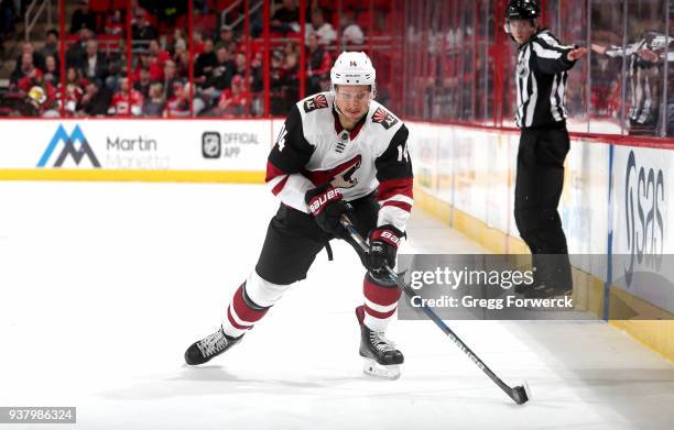 Richard Panik of the Arizona Coyotes controls the puck during an NHL game against the Carolina Hurricanes on March 22, 2018 at PNC Arena in Raleigh,...